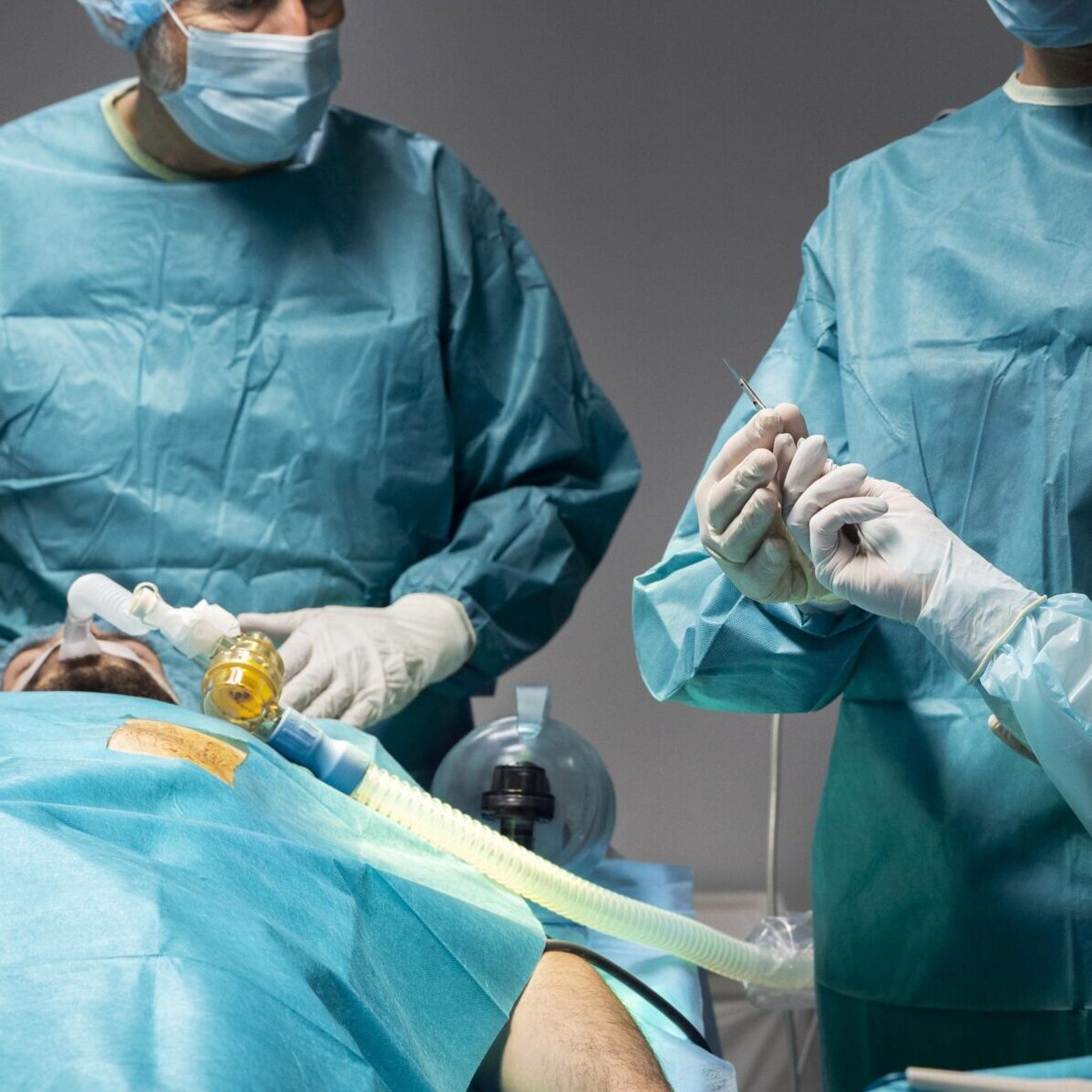 different-doctors-doing-surgical-procedure-patient-min